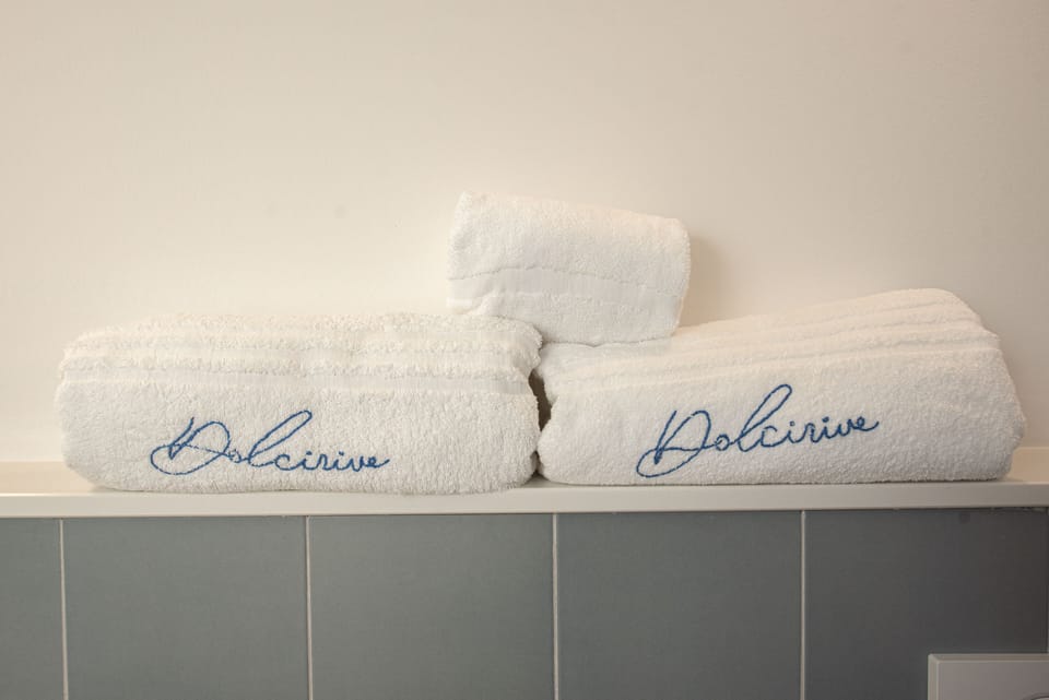 Shower, rainfall showerhead, hair dryer, bathrobes