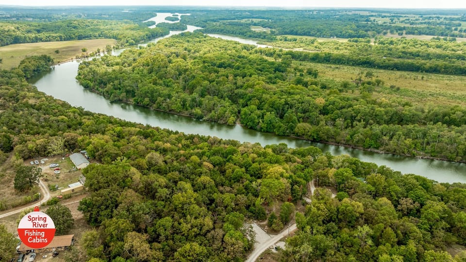 Spring River flows south to Twin Bridges and Grand Lake