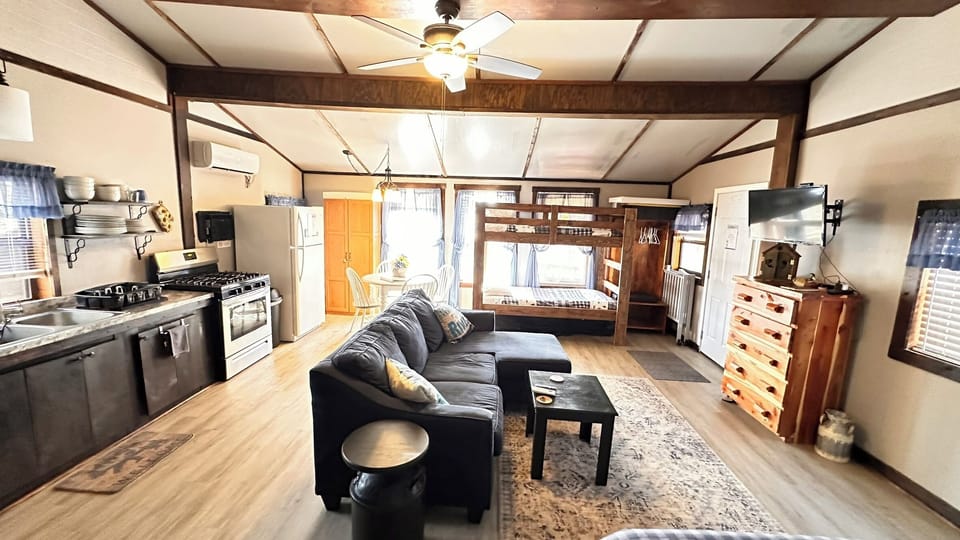 King Bed, 2 Twin beds (bunk), Queen floor mattress, and travel crib.