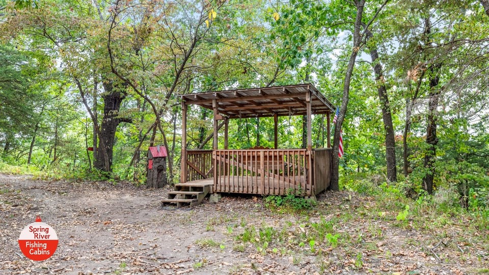 These areas are shared with 3 other cabins: trails, playground, swings, River Deck, pavilion, and Spring River.
