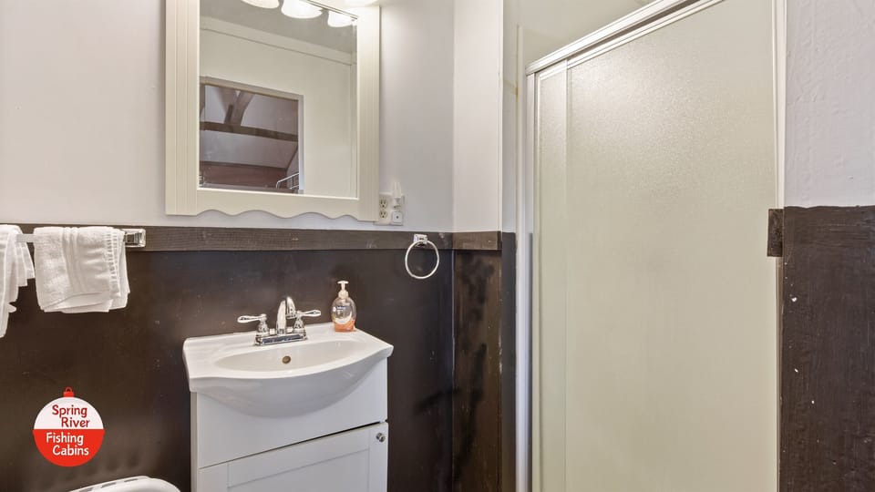 Bathroom has a shower.
