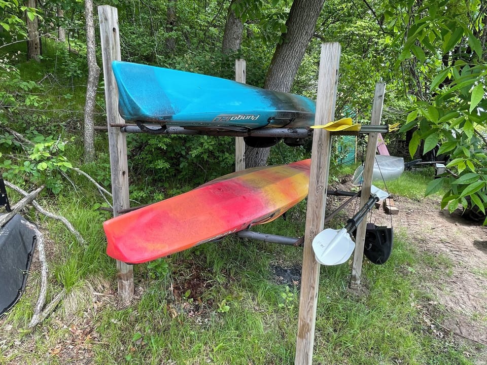 Kayaks, paddle boats, and a canoe available to use any time