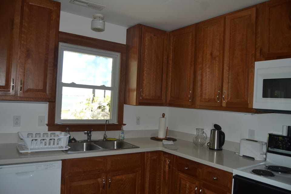 Hand made cherry kitchen cabinets