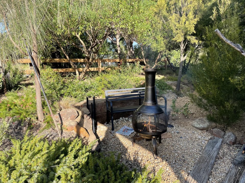 Enjoy the new fire pit area we’ve created with an outdoor chiminea. 
