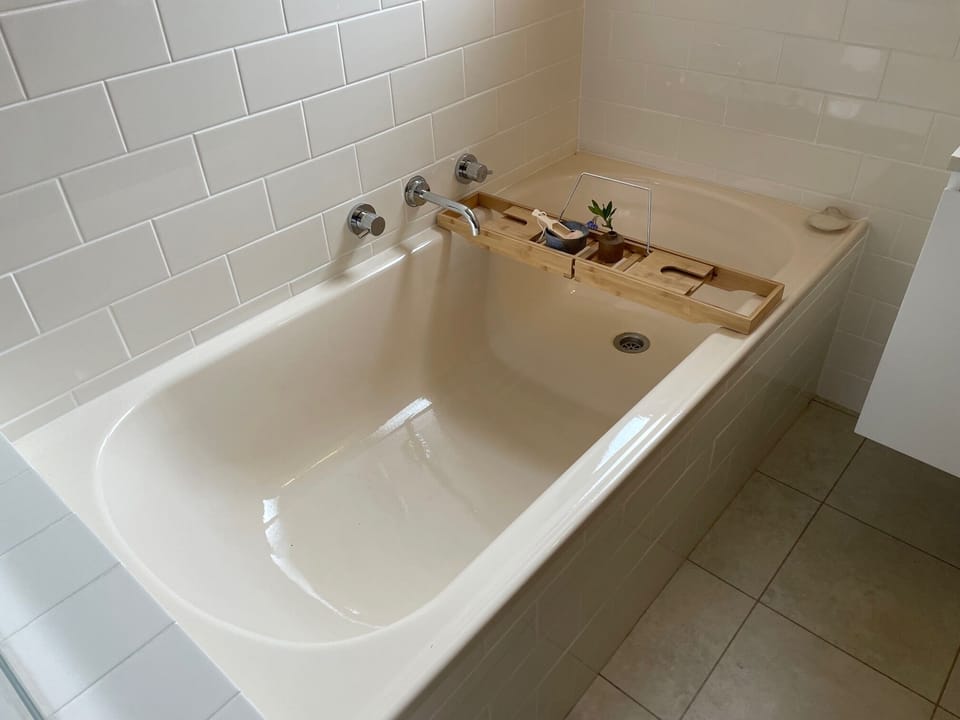 The main bathroom is perfect for families or for a long soak in the tub. 