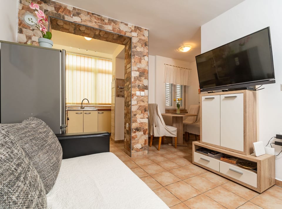 Apartment (Two Bedroom Apartment with Loggia and) | Living room | 25-inch TV with cable channels