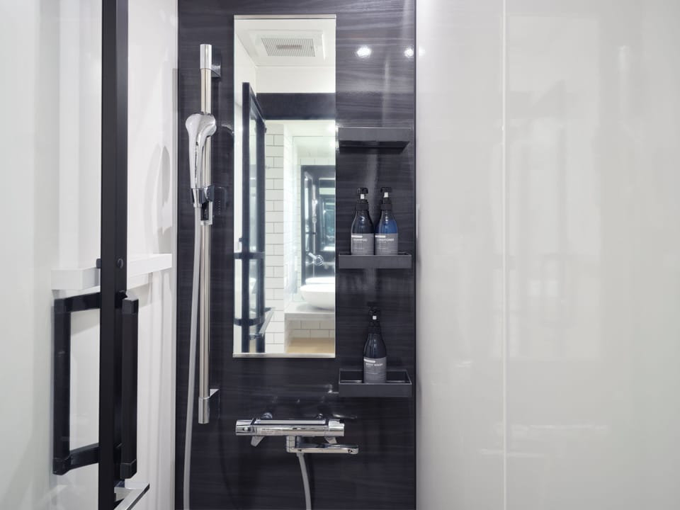 Shower, slippers, bidet, towels