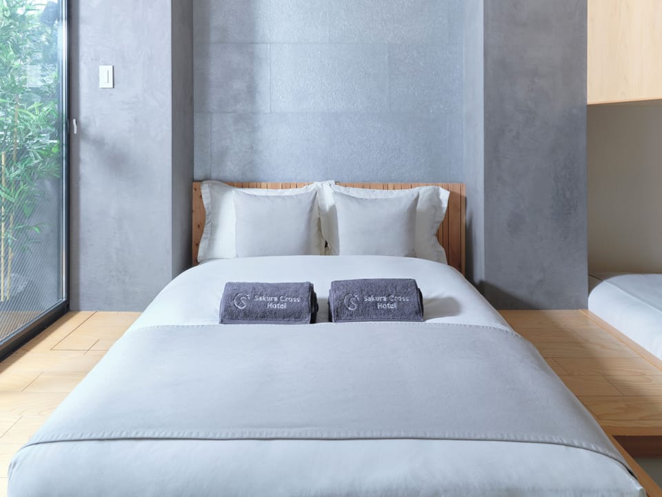 Deluxe Family Room Max7 Comfort4, Non Smoking | Down comforters, desk, free WiFi, bed sheets