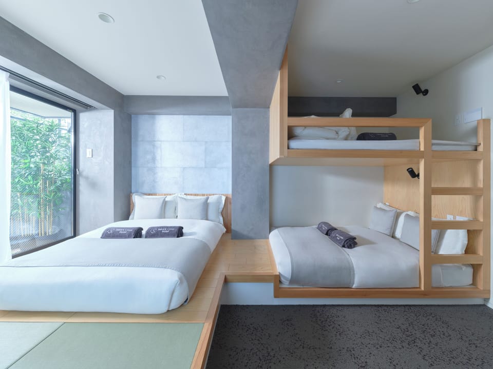 Deluxe Family Room Max7 Comfort4, Non Smoking | Down comforters, desk, free WiFi, bed sheets
