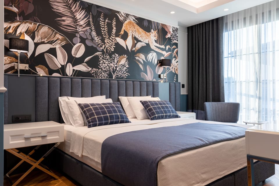 Deluxe Double Room with Balcony | In-room safe, desk, laptop workspace, soundproofing