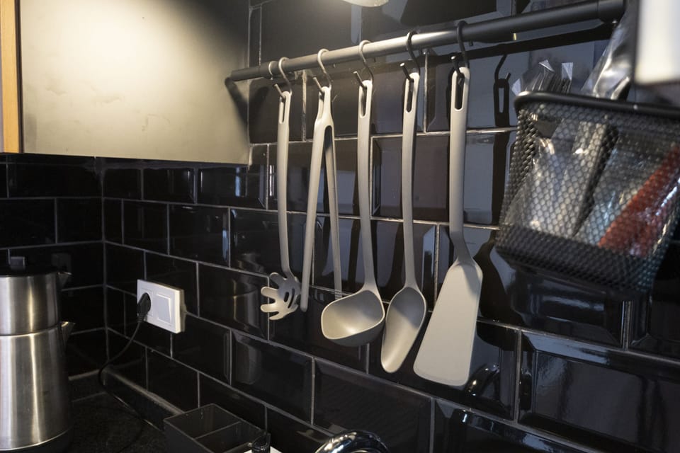 Mini-fridge, eco-friendly cleaning products, paper towels
