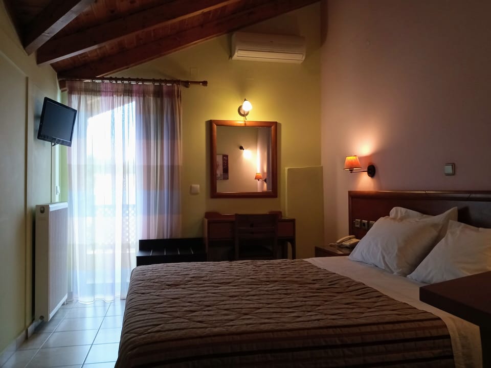 Deluxe Double Room | Premium bedding, down comforters, laptop workspace, WiFi (free)