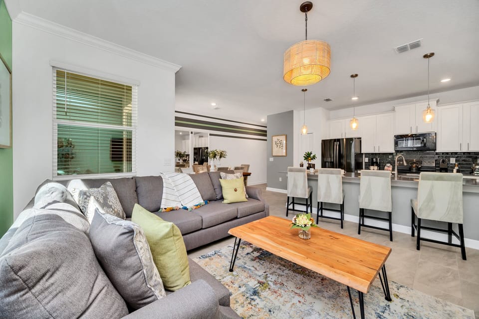 The Living room  has a comfortable seating, modern decor, and a cozy ambiance, it provides the perfect space for relaxation and leisure during your stay.