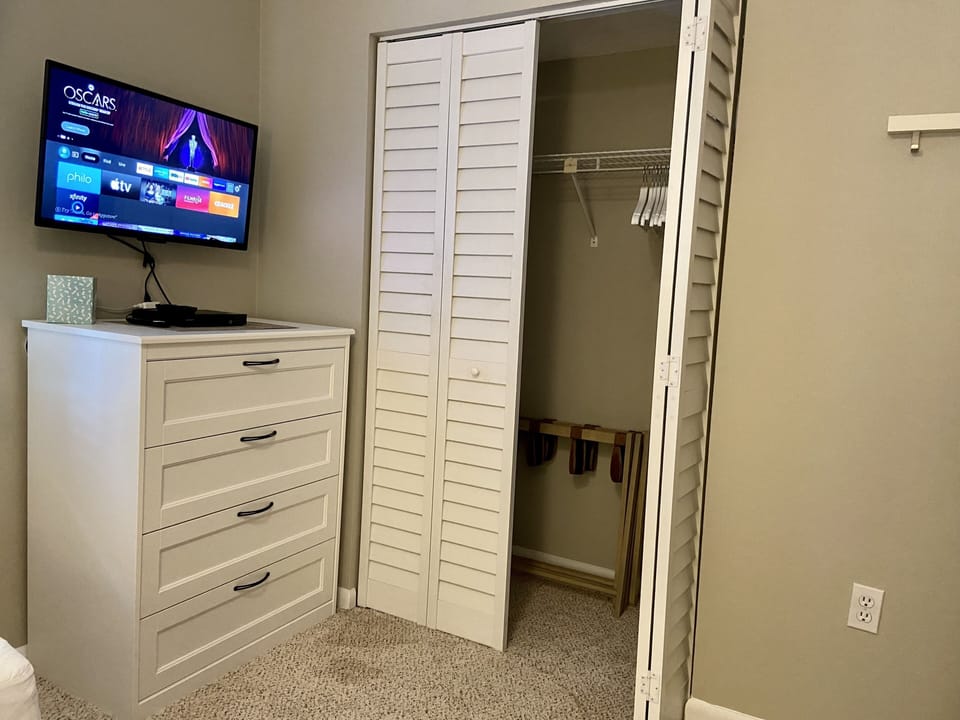 Plenty of storage, and a DVD player, in the second bedroom.