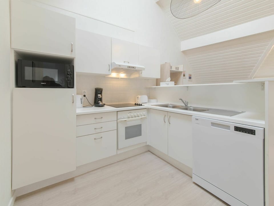 Cabinetry, Countertop, Kitchen Appliance, Kitchen Stove, Home Appliance, Kitchen, Wood, Building, Interior Design, Drawer