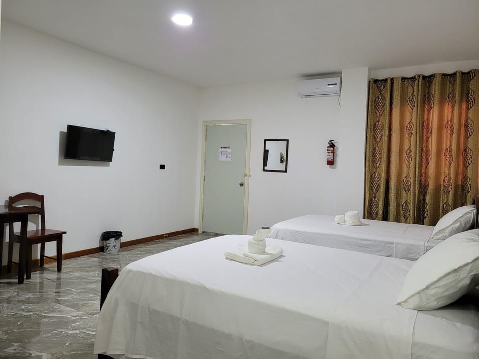 Business Double Room, 2 Double Beds | Blackout drapes, iron/ironing board, WiFi (free), bed sheets