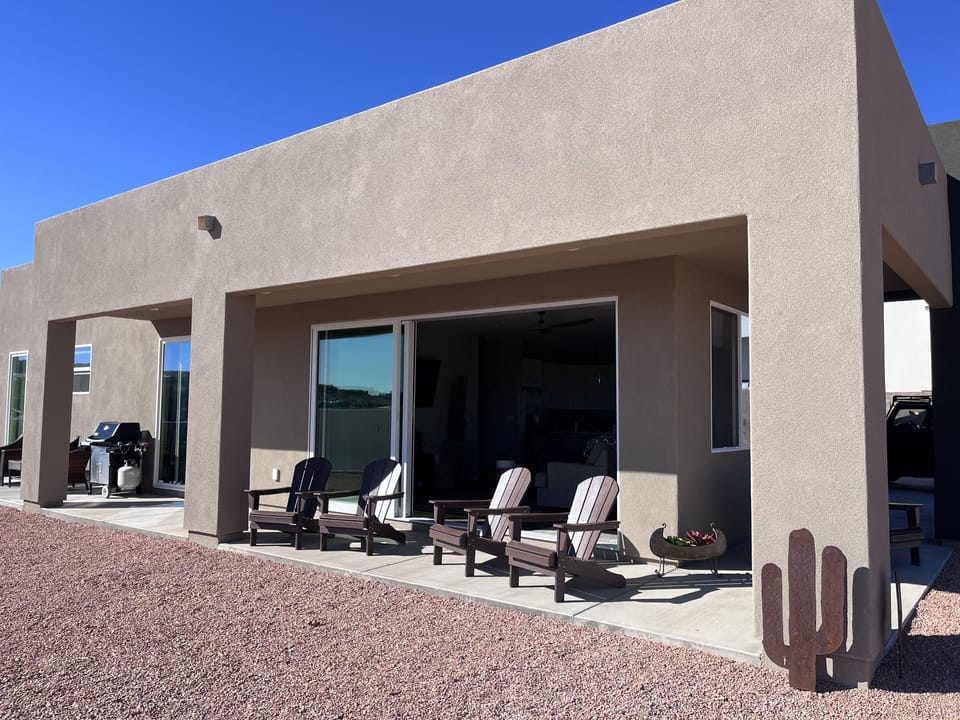 Plenty of outdoor furniture and gas grill
