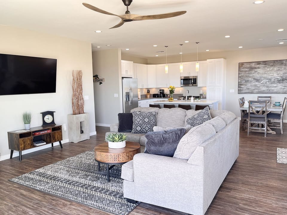 Open floor plan in living room, kitchen &  dining room