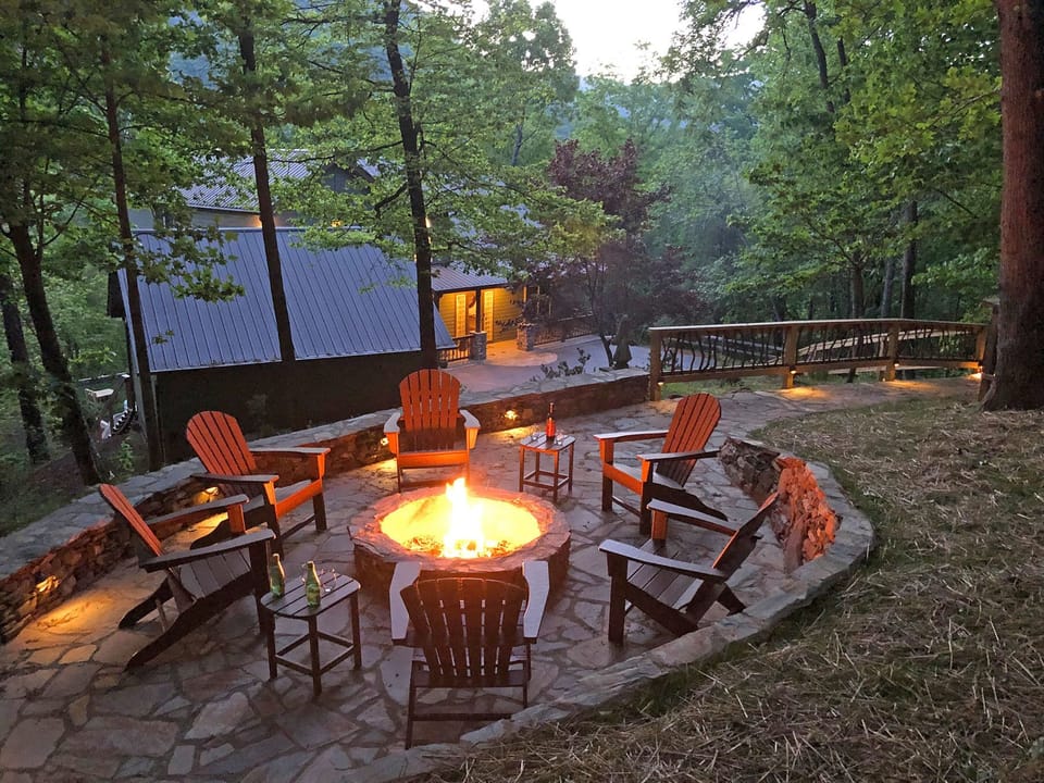 Amenities to enjoy year-round, including a beautiful stone fire pit area overlooking the house and mountains....