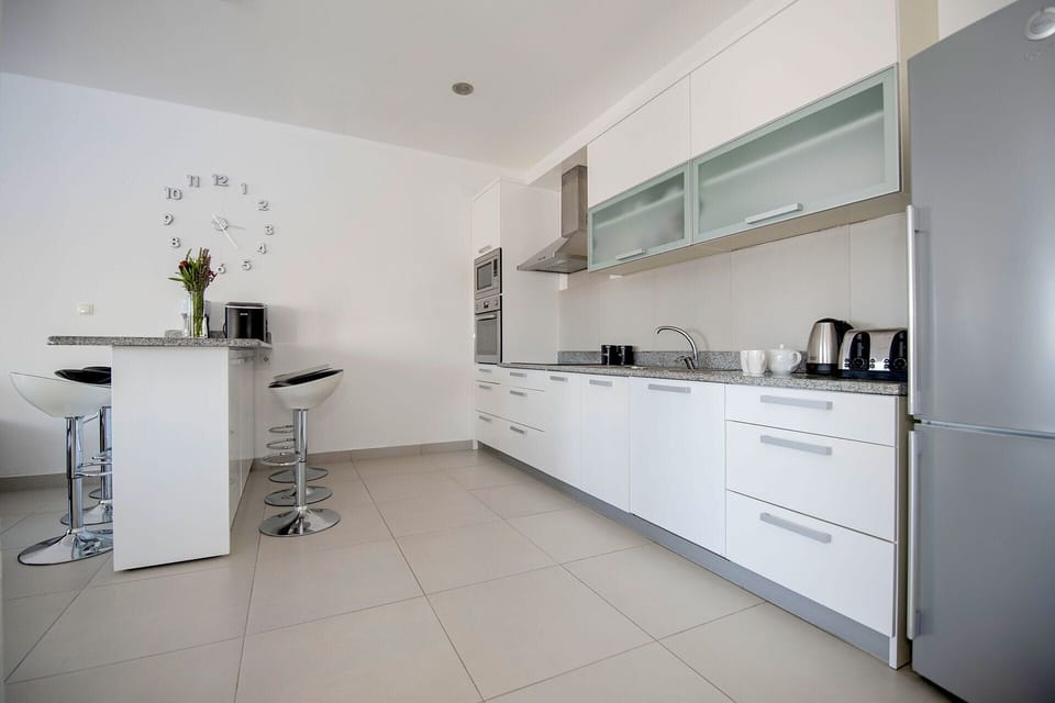 Large fully fitted kitchen with ice machine, dishwasher, microwave, etc.