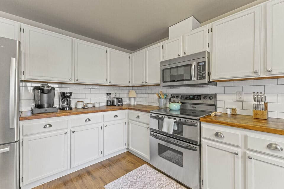 Coffee station with Keurig and drip options, K-cups, cream, and sugar all included
