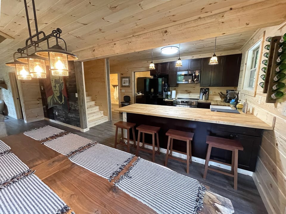This is a view of the kitchen and access to the second floor.