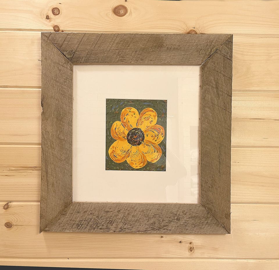 Our cabin is adorned with paintings my son and I made, including the frames.
