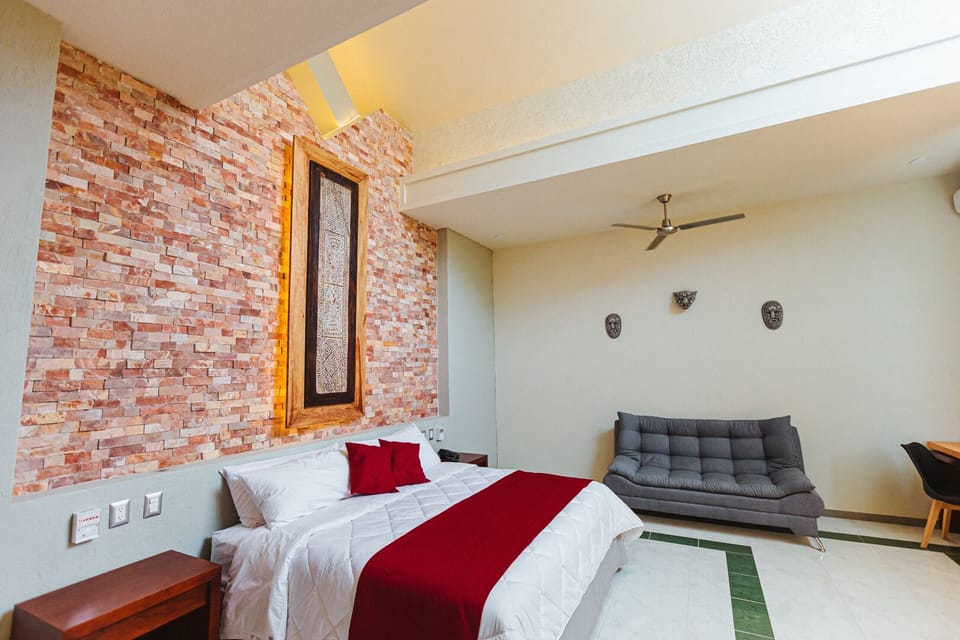 Premium Room | Down comforters, individually furnished, blackout drapes