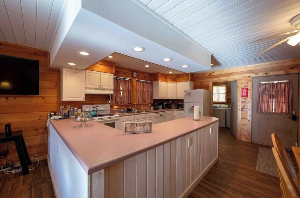 Complete with pots, pans, pancake griddle,  crockpot, microwave & coffee pot.