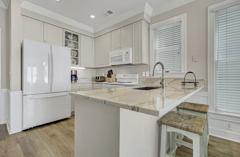 Updated kitchen appliances and granite countertop.