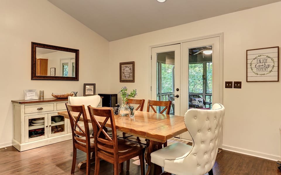 Charming dining space with natural light, perfect for meals and memories.