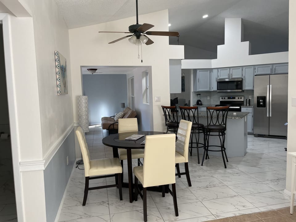 BEAUTIFUL OPEN CONCEPT LAYOUT - let's visit the sunroom.