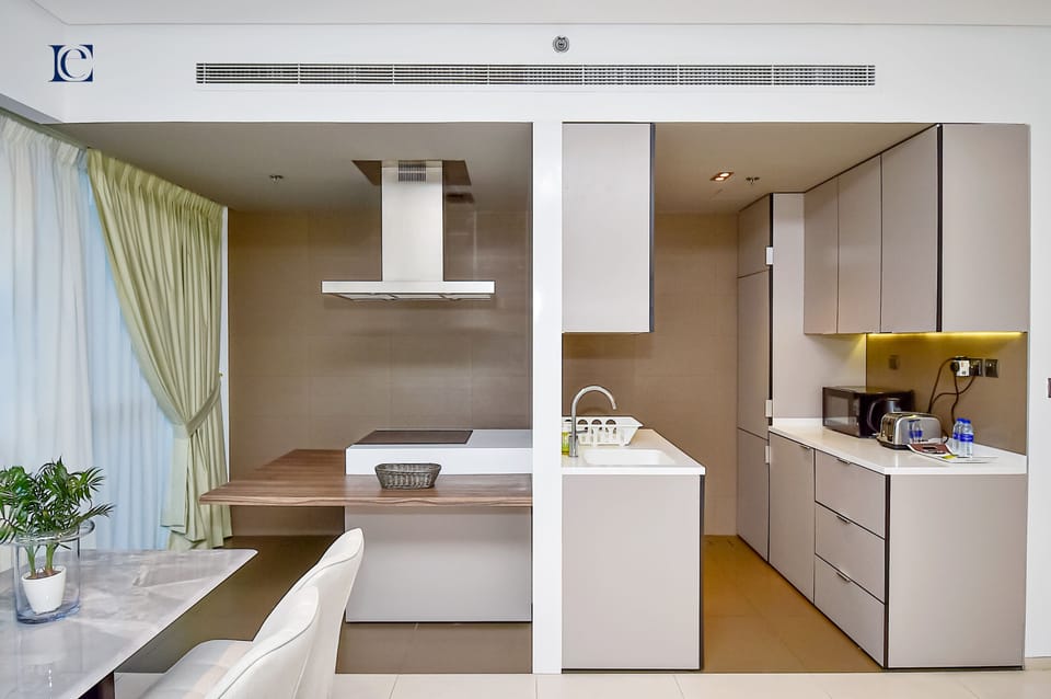 Apartment | Private kitchen | Full-size fridge, microwave, oven, stovetop