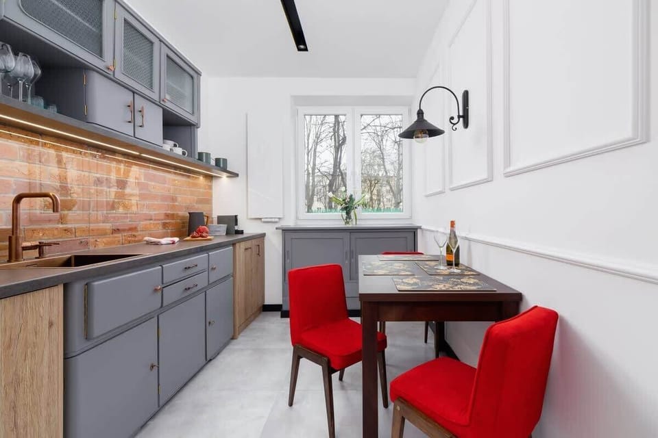 The kitchen features a stylish and functional design. 