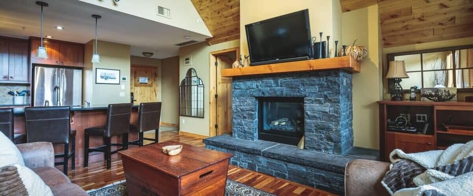 A cozy living space that flows effortlessly into the dining and kitchen area.