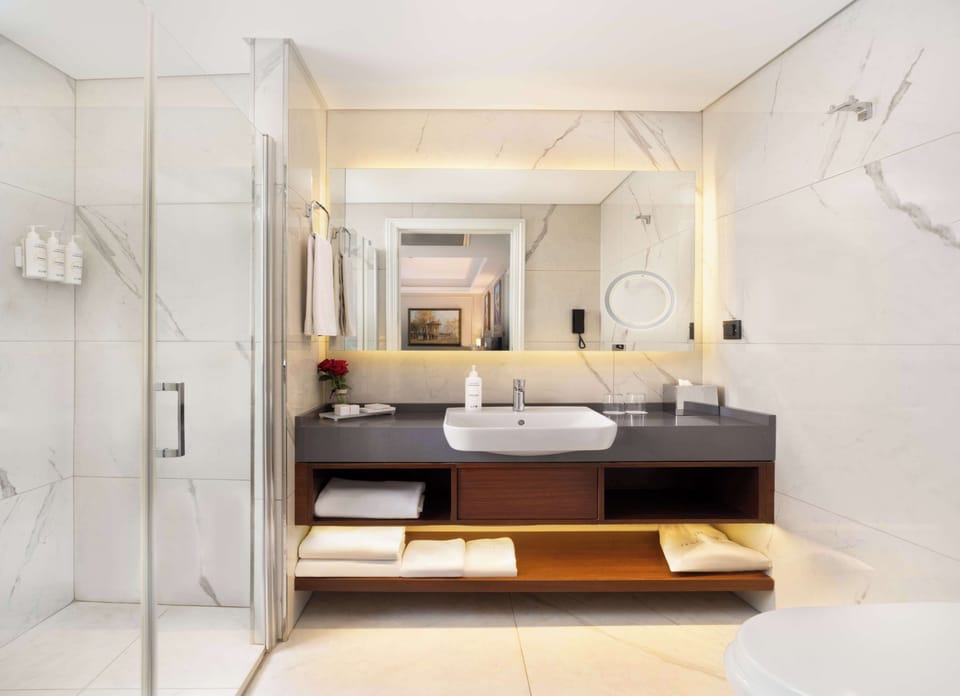 Rainfall showerhead, free toiletries, hair dryer, slippers