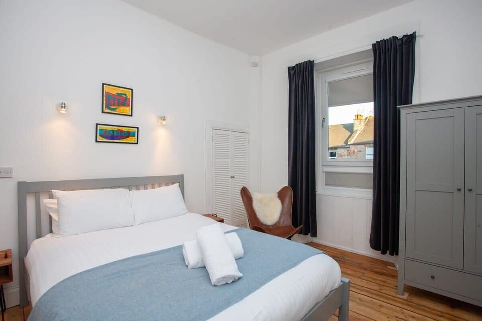 Spacious modern bedroom with lots of storage space