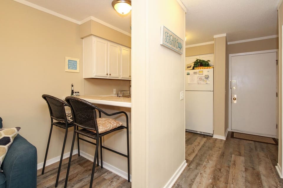 Serving bar open to kitchen. 