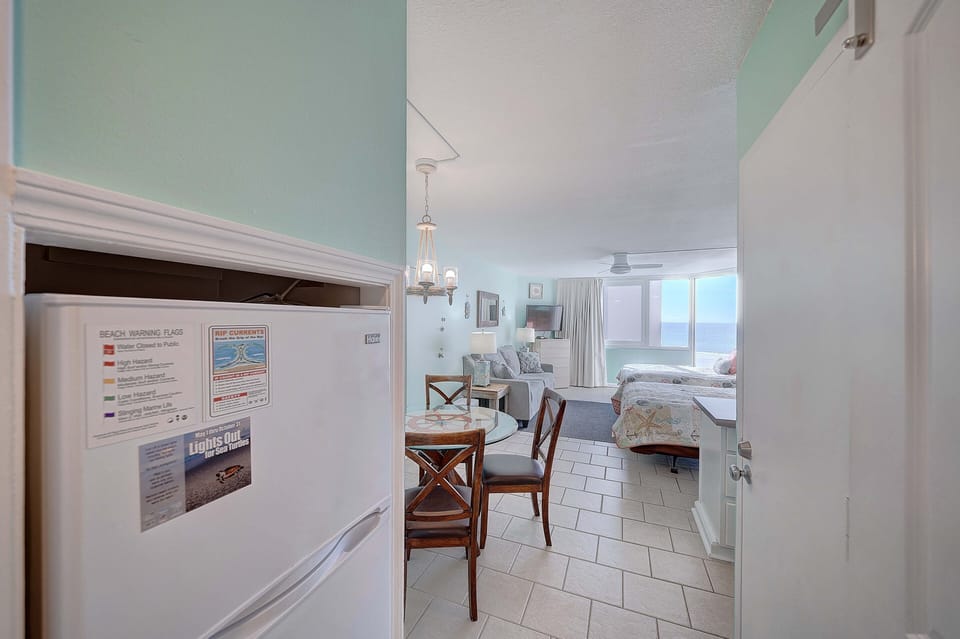 Full sized refrigerator.