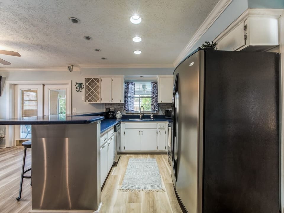 Open concept kitchen - easy flow to living room and patio