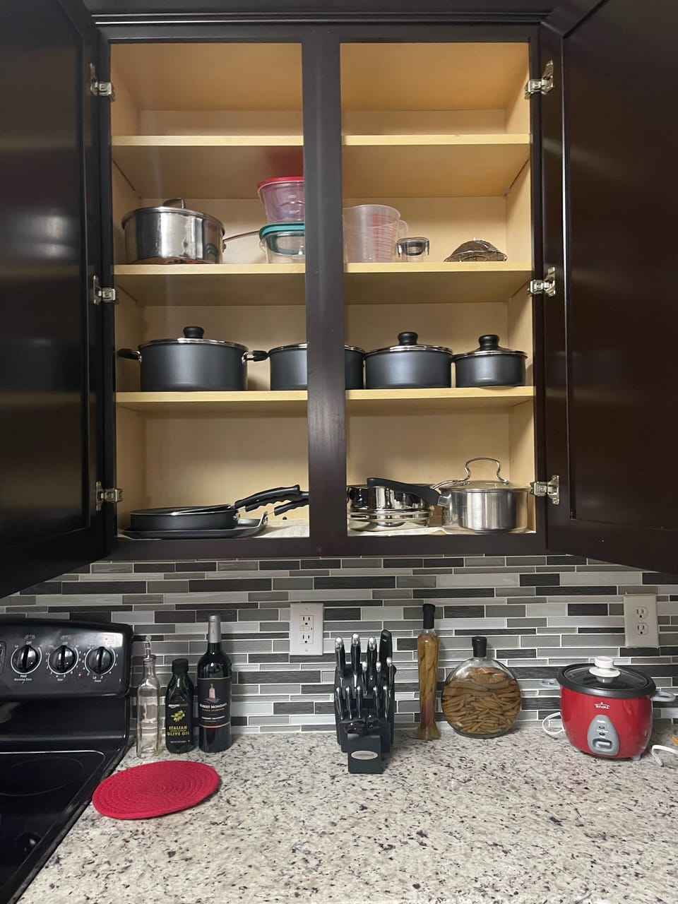 Rice cooker, electric stove, all cutlery available. Bring out your inner chef :-