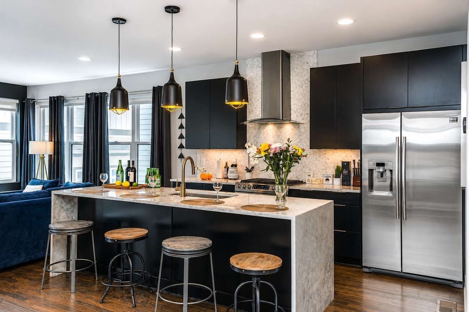 Bright, modern kitchen with stainless steel appliances, stocked essentials, and a coffee station for the perfect morning brew.