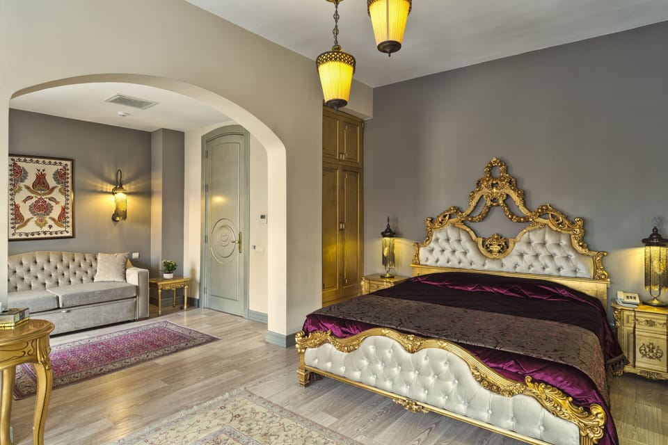 Deluxe Quadruple Room | Premium bedding, minibar, in-room safe, desk