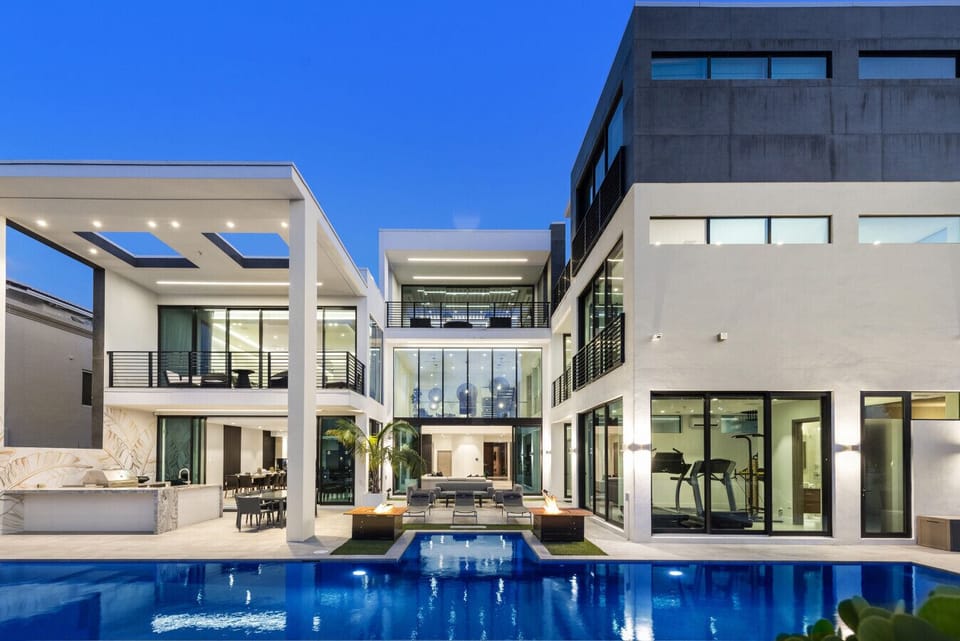 Contemporary estate featuring resort-style pool and spacious outdoor living