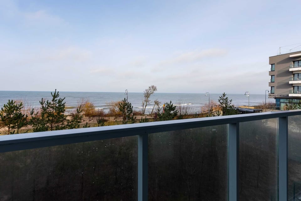 The balcony's stylish design ensures a pleasant stay. 