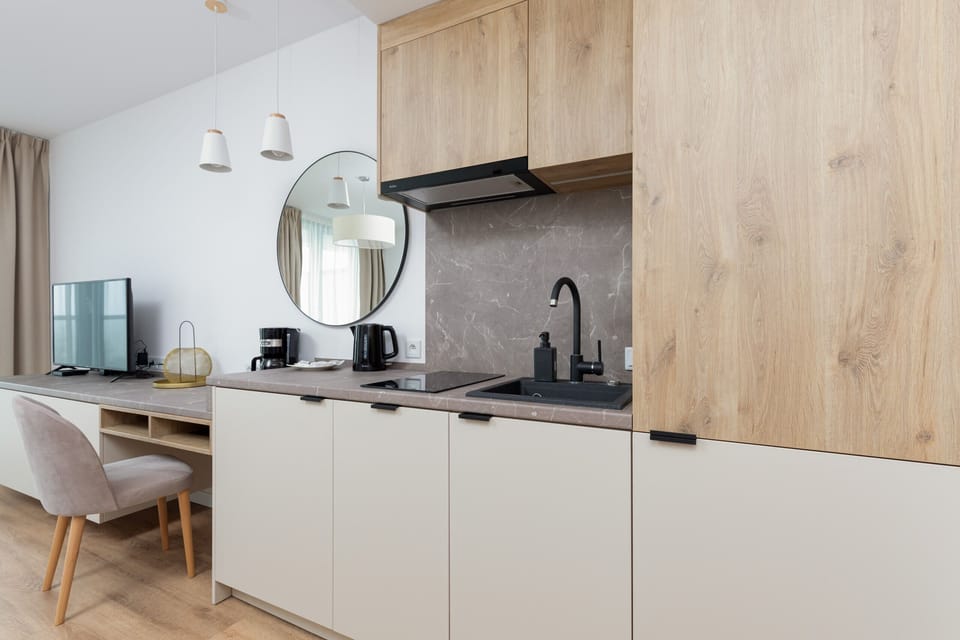 The fully equipped kitchenette includes everything you need for a home-cooked meal.