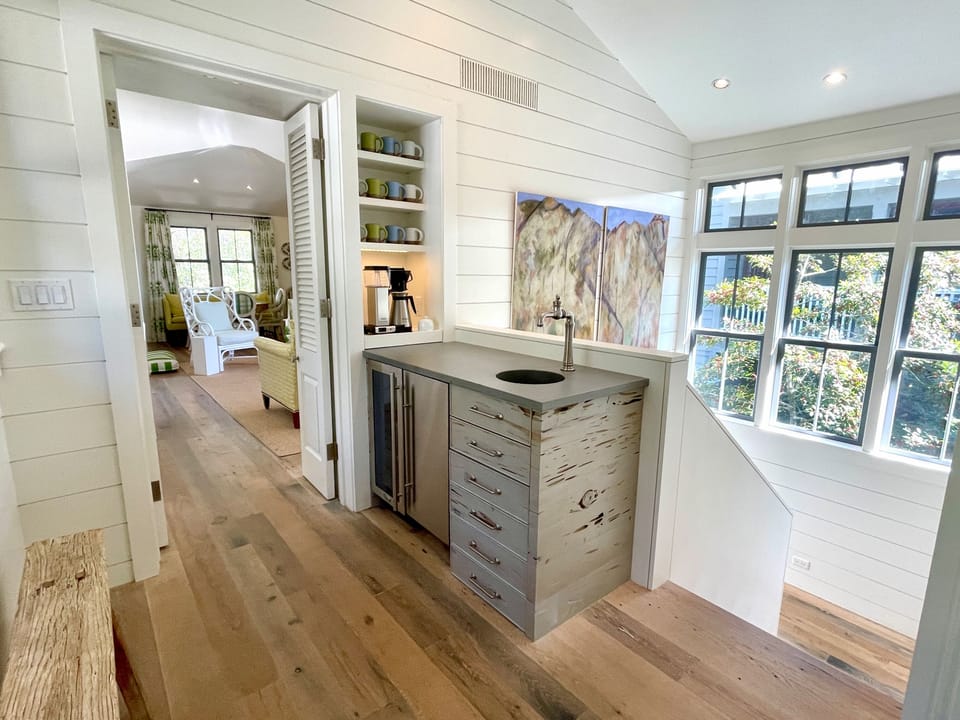 SECOND FLOOR LANDING BAR AREA, W/BEVERAGE FRIDGE AND ICE MAKER