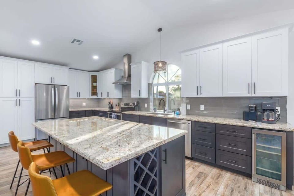 Large Updated Kitchen with Wine Fridge and Island Seating