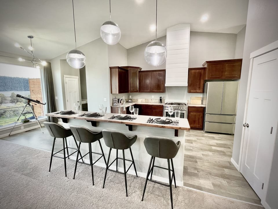 Kitchen with bar seating for four.
