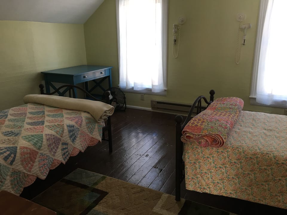 First bedroom on the second floor.  Two single beds.